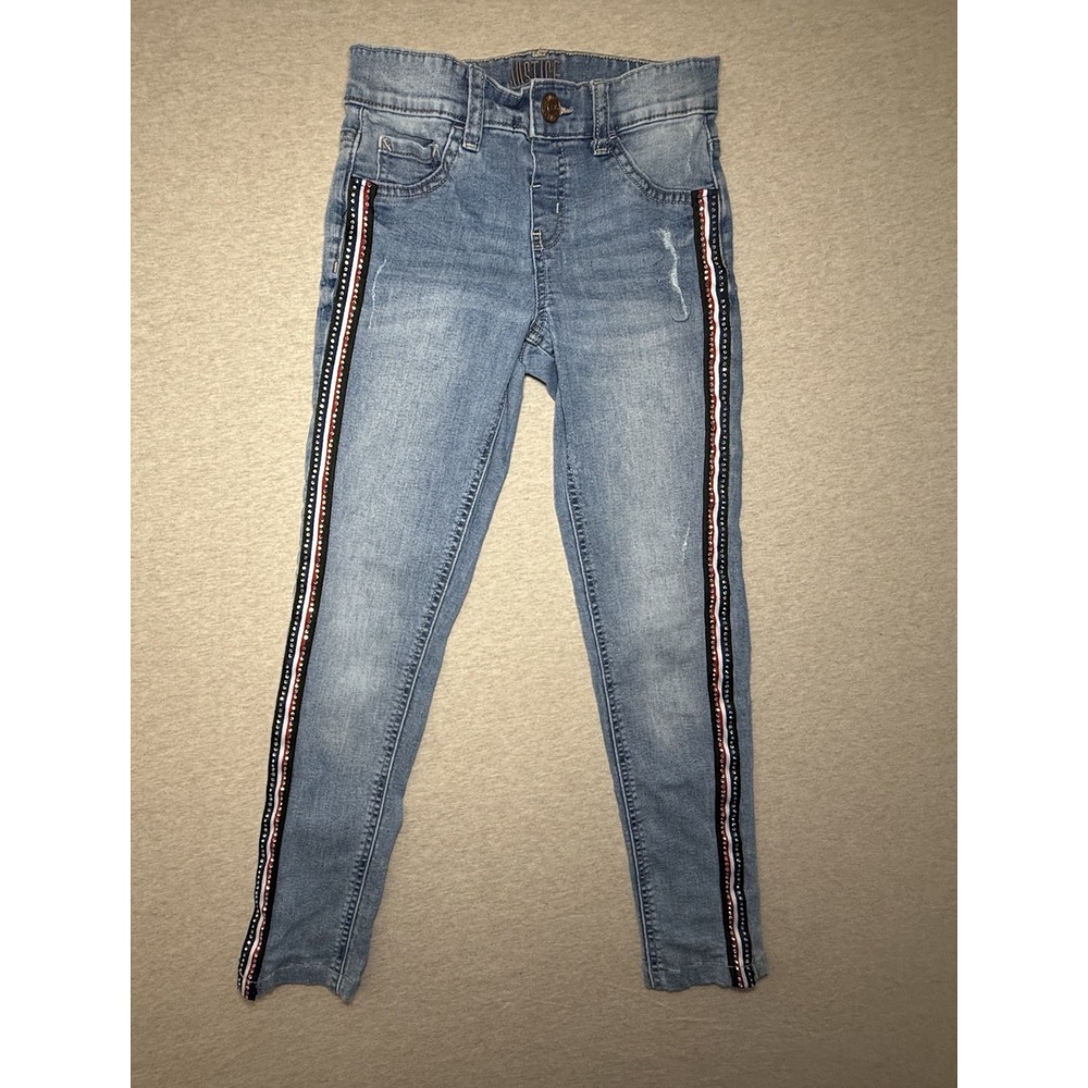 Justice. girl size 10. blue jean with red white and blue side. 4th of july.